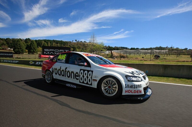 Racing Car on Track — White, Active, Afternoon