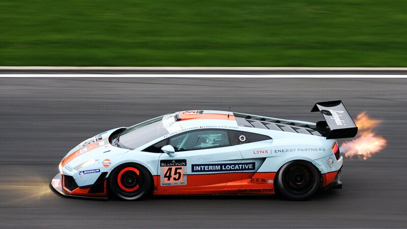 Racing Car on Track — White, Dynamic, Photograph, Fire