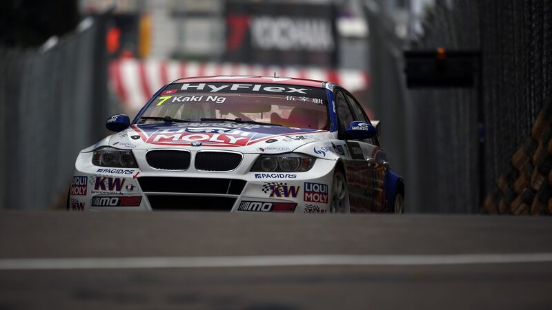 Racing Car on Track — White, Dynamic, Photograph, Race Car, Fence, Blue