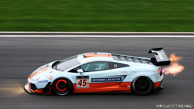 Racing Car on Track — White, Dynamic, Photograph, Race Car, Flames, Orange