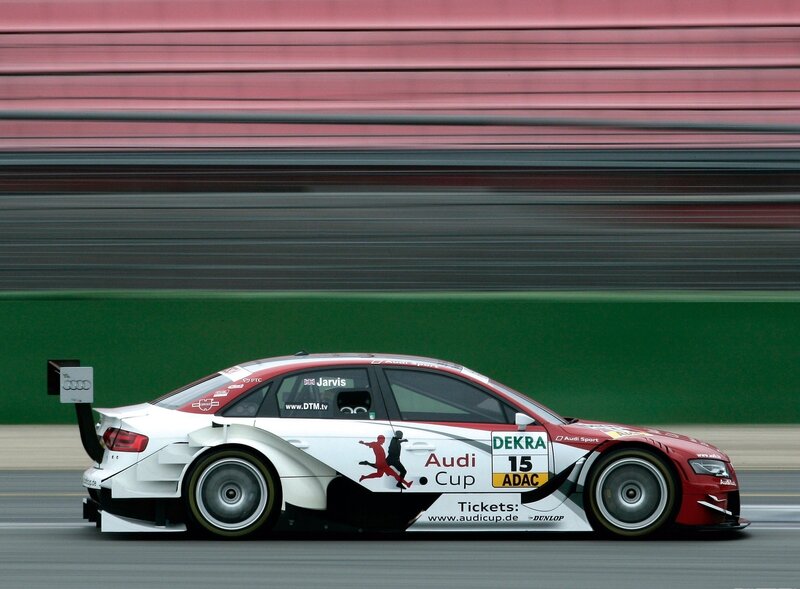 Racing Car on Track — White, Dynamic, Photograph, Race Car, Sponsor Logos, Red