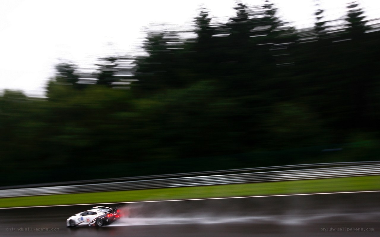 racing car on wet track