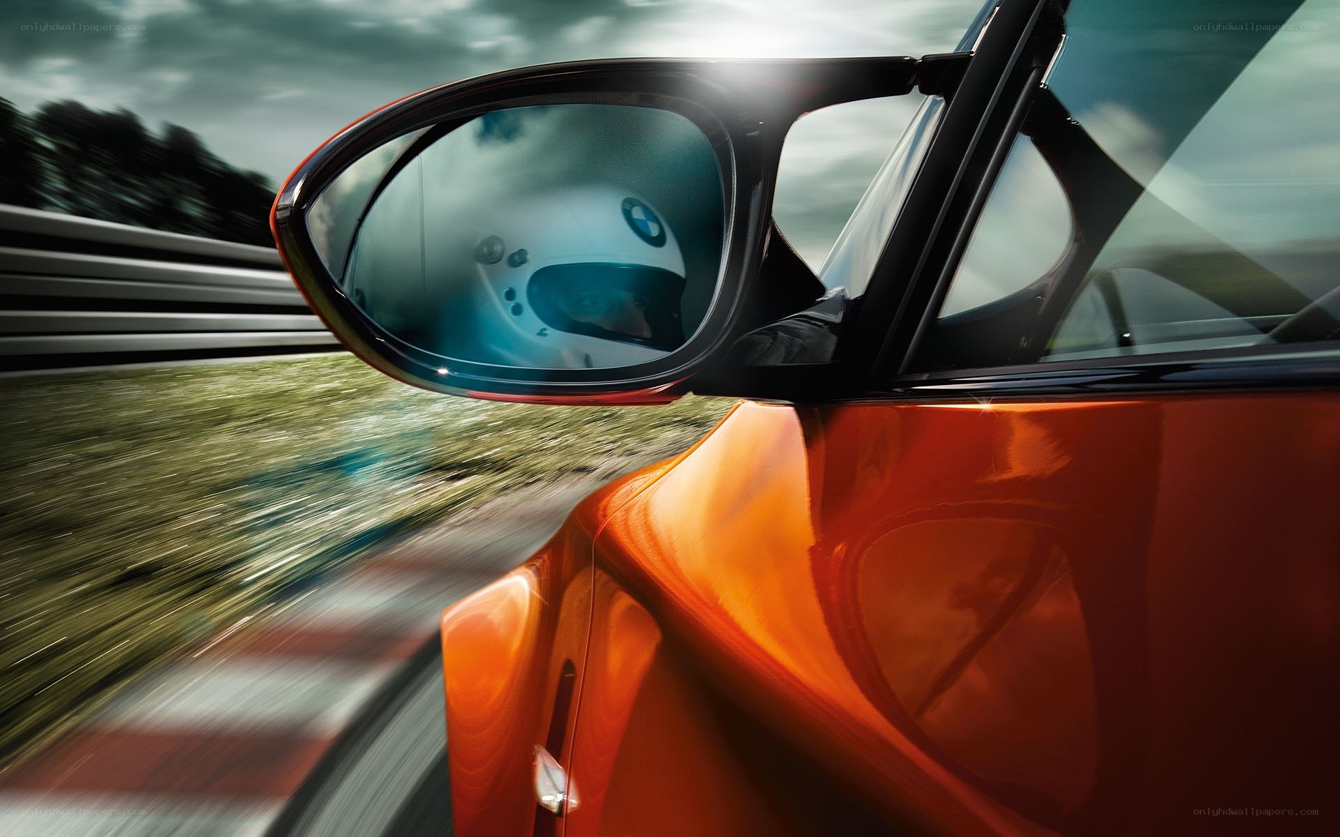Racing car side mirror reflection