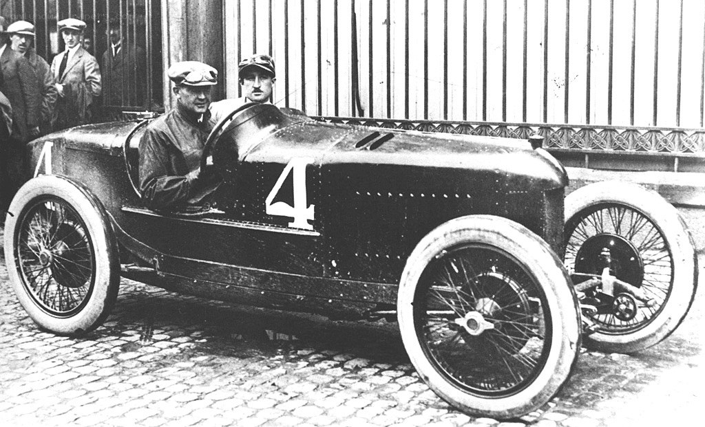 Racing car with driver and mechanic