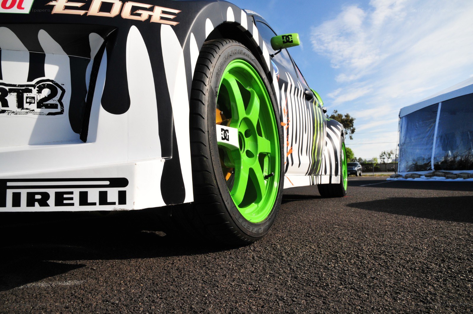 racing car with green wheels