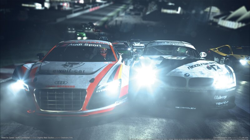 racing cars at night