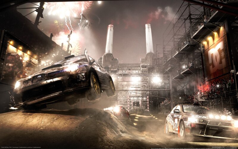 Racing cars at night with fireworks