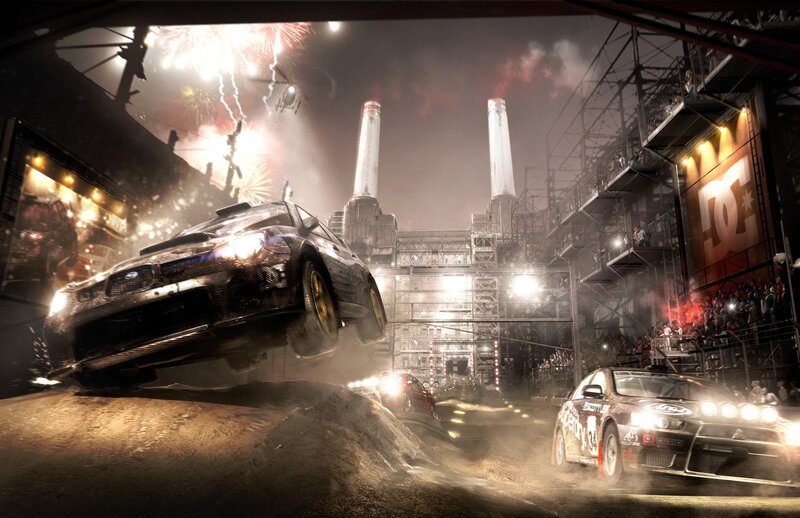 Racing cars at night with fireworks
