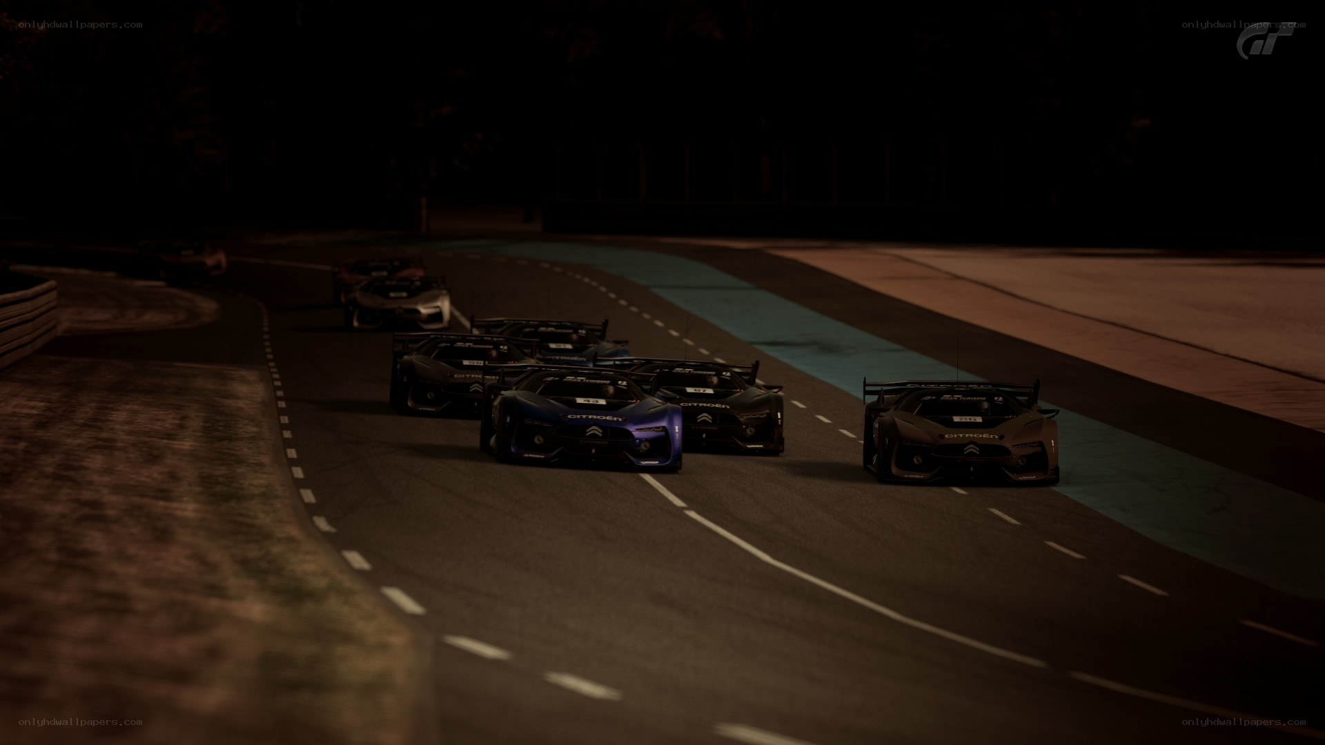 racing cars at night