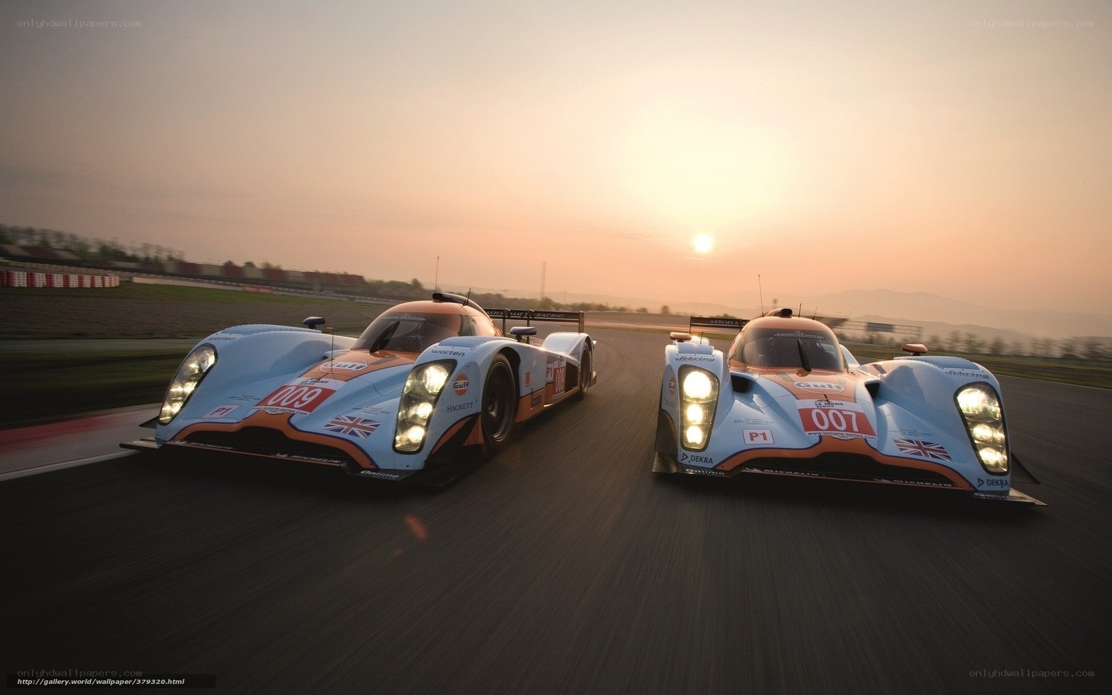 racing cars at sunset