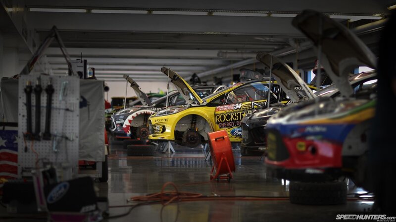 racing cars in a garage