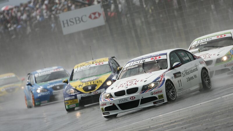 racing cars in rain