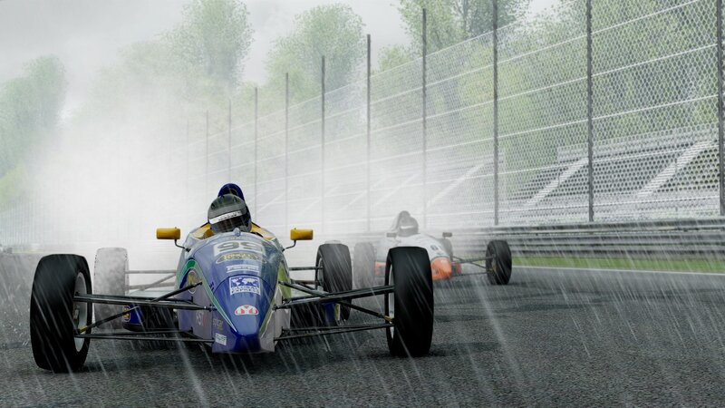 racing cars in the rain