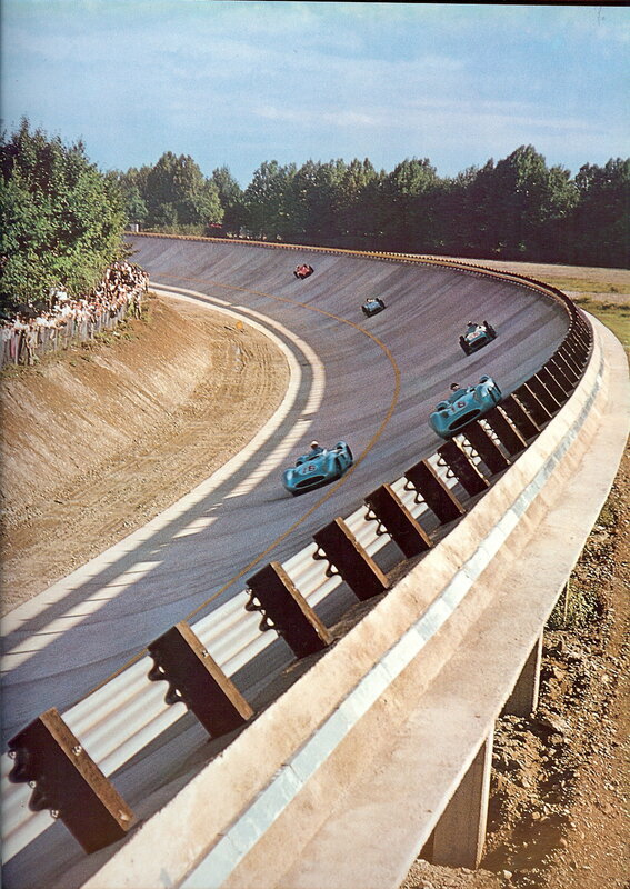 Racing cars on a banked track