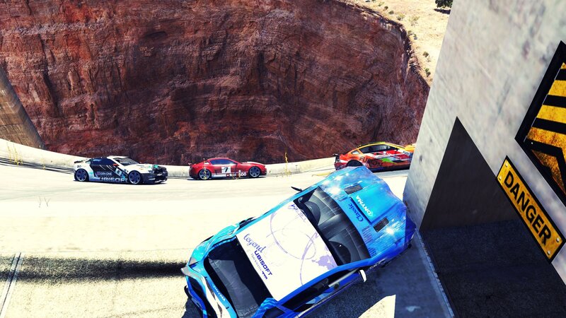 Racing cars on a canyon track