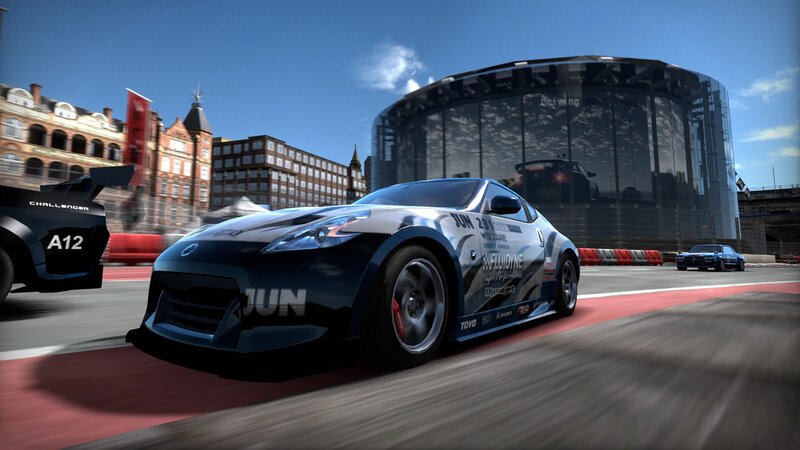 racing cars on a city track