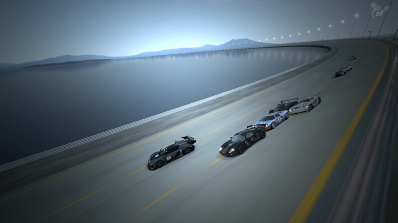 racing cars on a coastal track