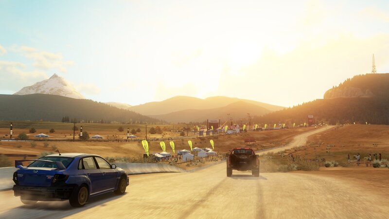 racing cars on a dirt track