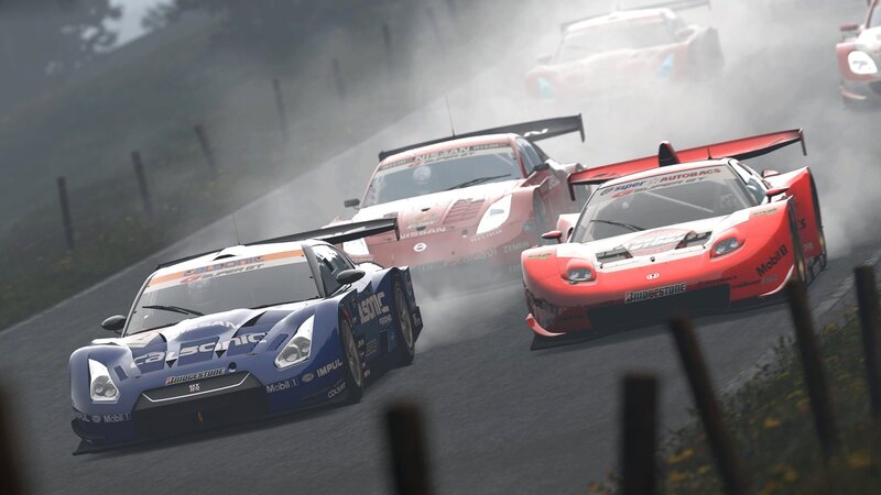 racing cars on a wet track
