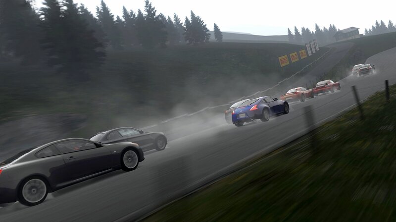 racing cars on a wet track