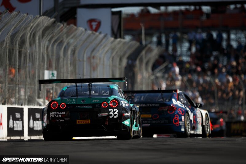 Racing Cars on Track — Black, Competitive, Afternoon, Photograph, Crowd
