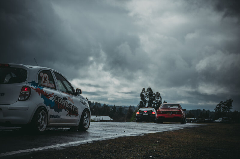 Racing Cars on Track — Gray, Dramatic, Afternoon