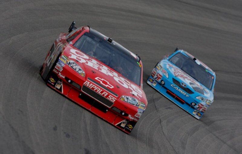 Racing Cars on Track — Red, Dynamic, Photograph, Race Car