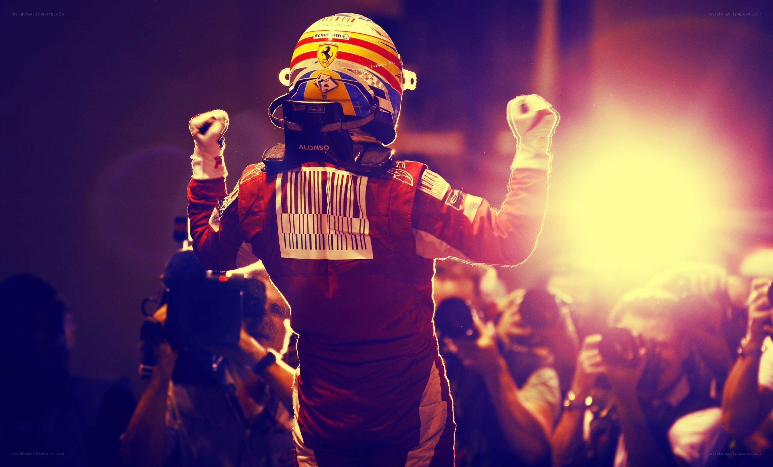 racing driver celebrates victory
