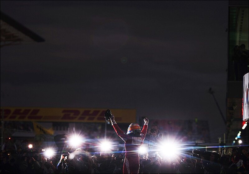 Racing Driver Celebrating — Black, Celebratory, Night