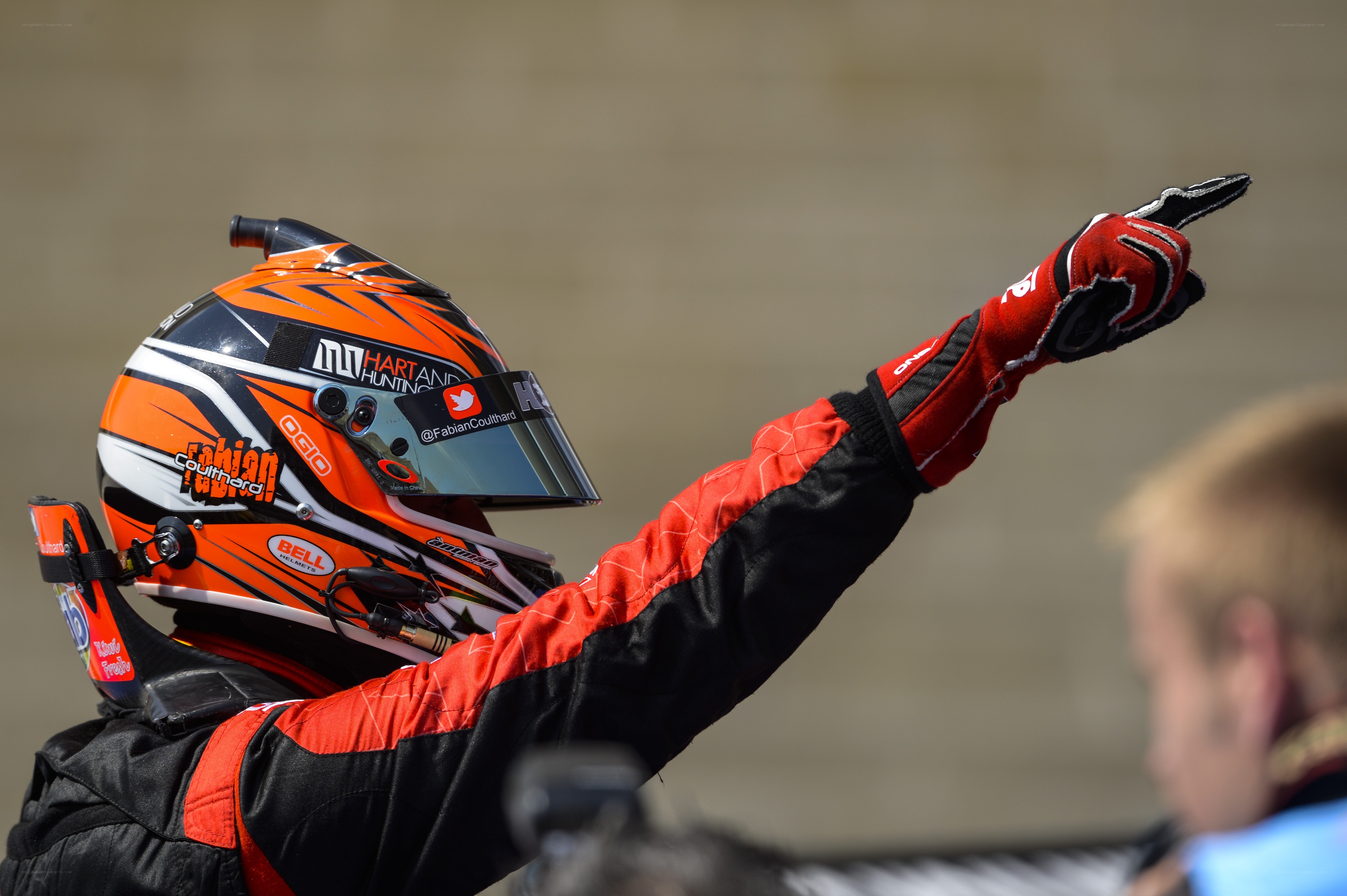 racing driver celebrating victory
