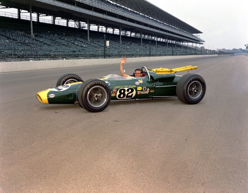 Racing driver in a green car