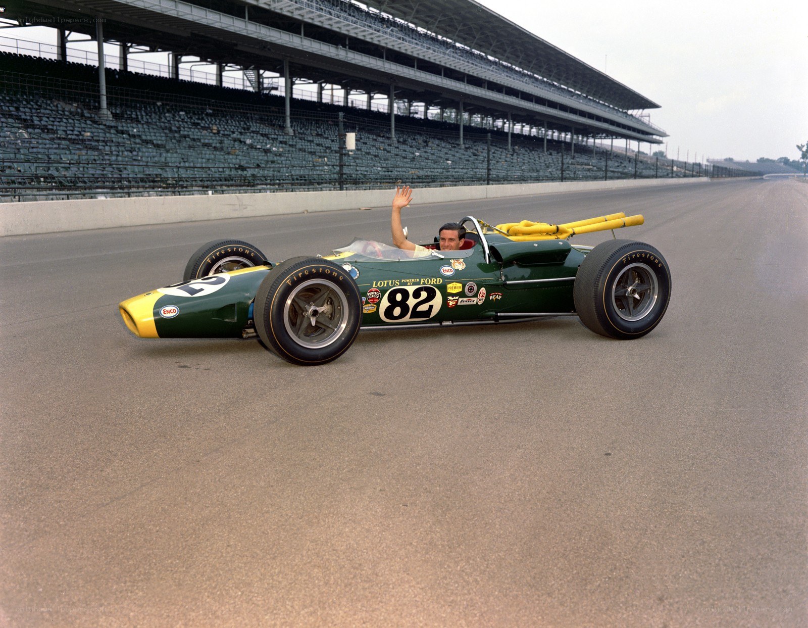 Racing driver in a green car