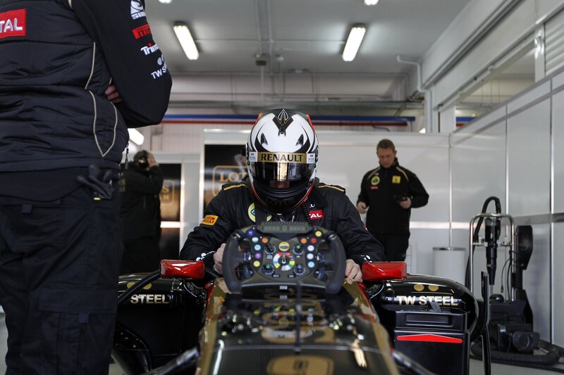 Racing Driver in Cockpit — Black, Focused, Photograph, Helmet, Race Car
