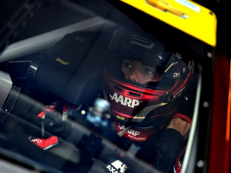 Racing Driver in Cockpit — Black