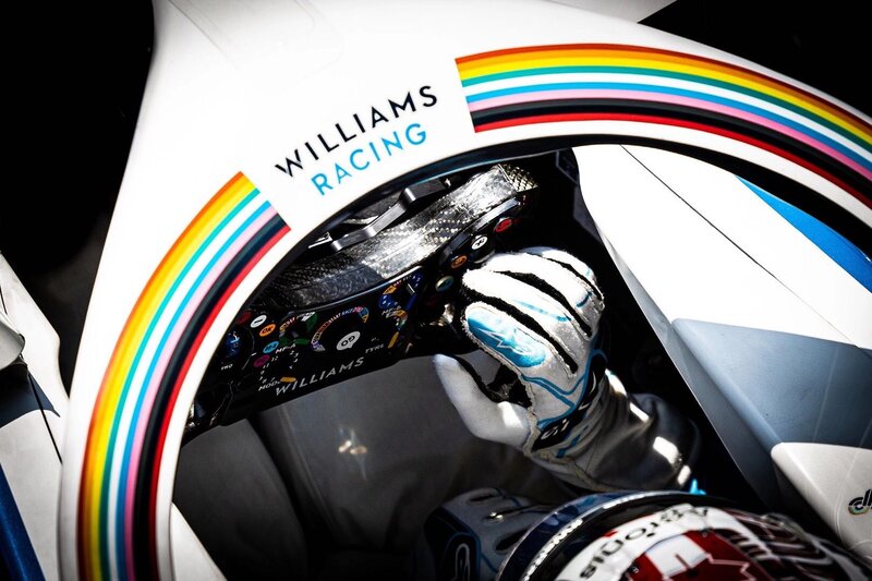 Racing Driver in Cockpit — White, Focused
