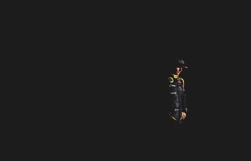 racing driver in dark setting