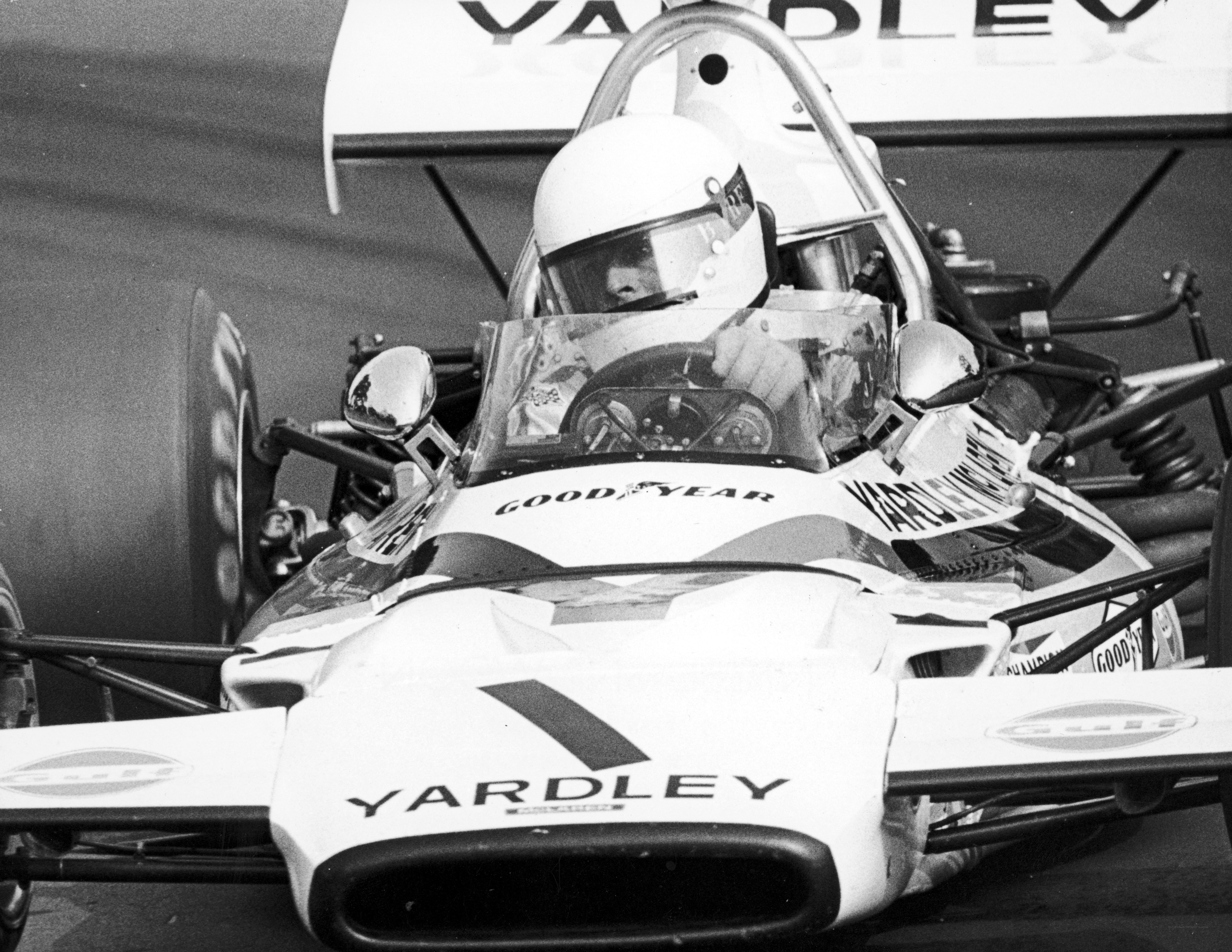racing driver in formula one car