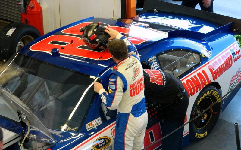 Racing Driver in Garage