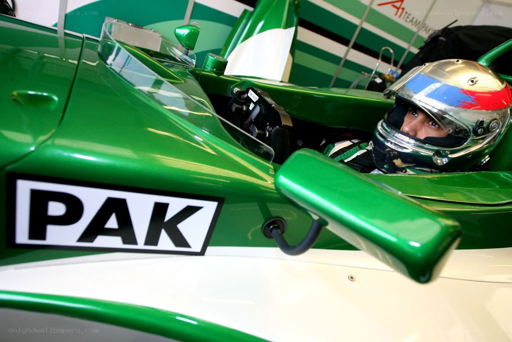 racing driver in green car