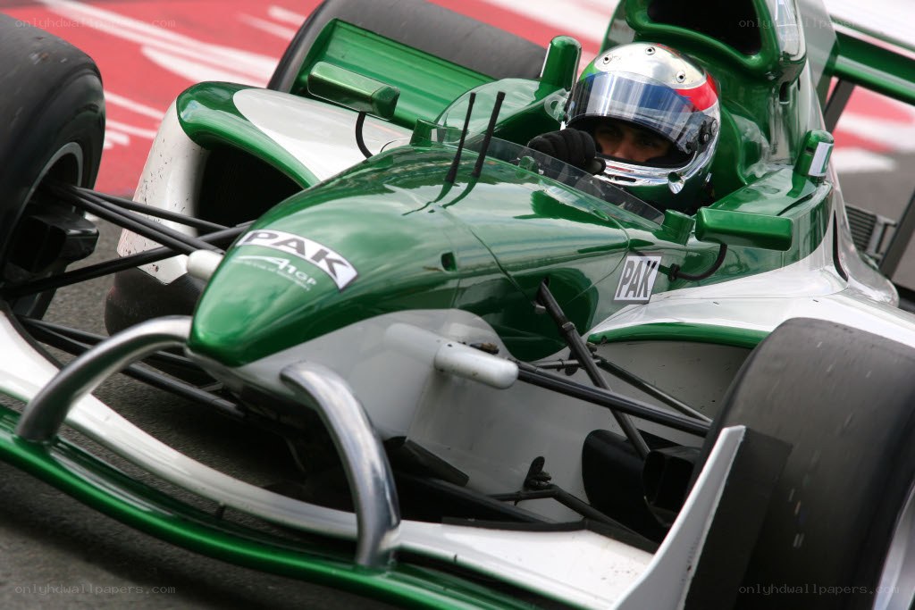 racing driver in green car
