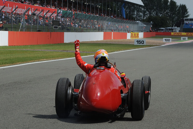 Racing Driver in Red Car — Celebratory