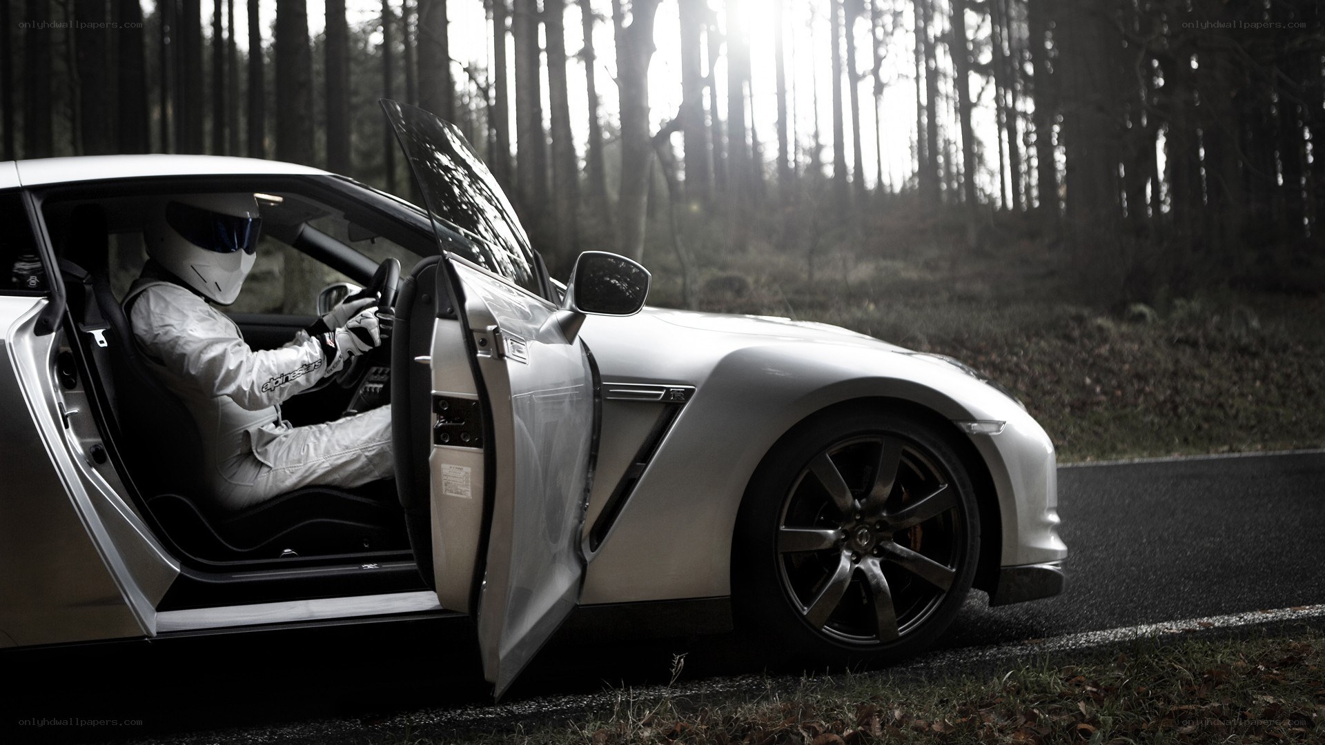 racing driver in silver car