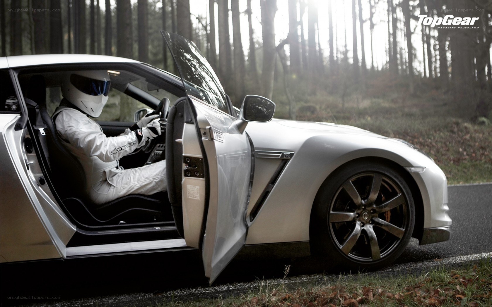 racing driver in silver car