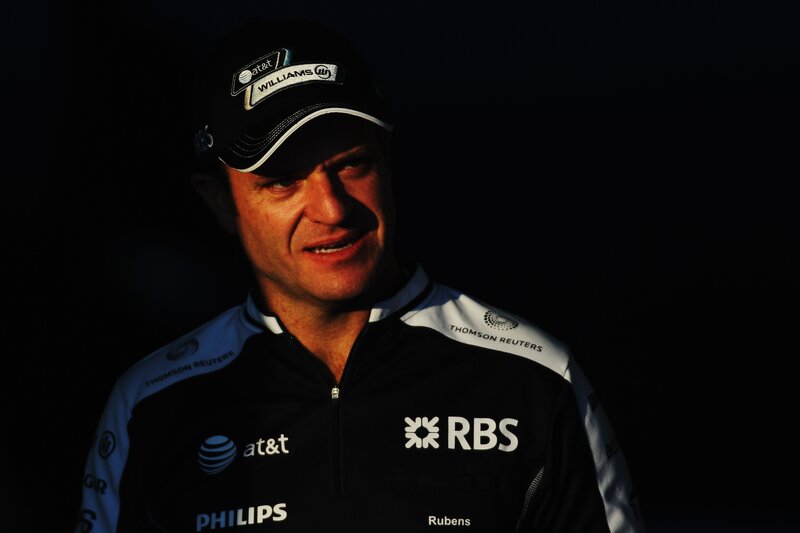 Racing driver in team apparel