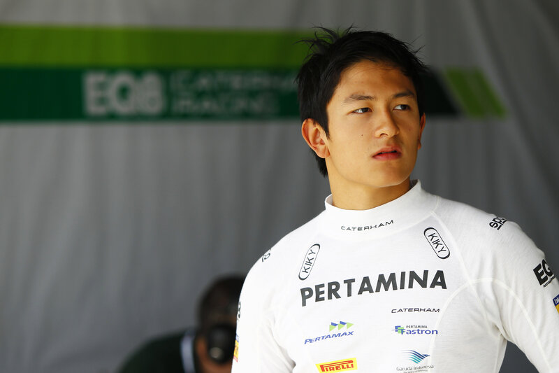 racing driver in white suit