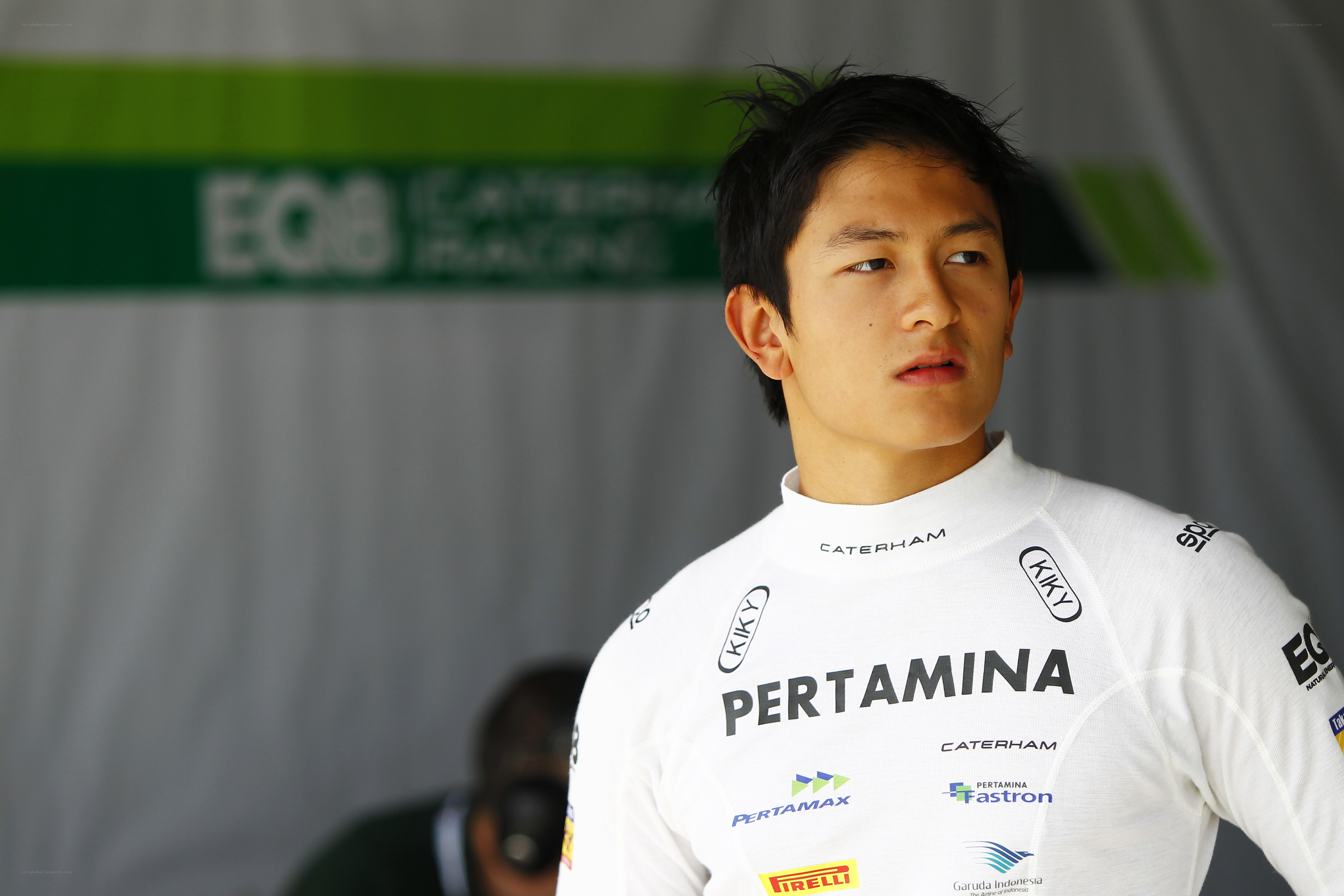 racing driver in white suit