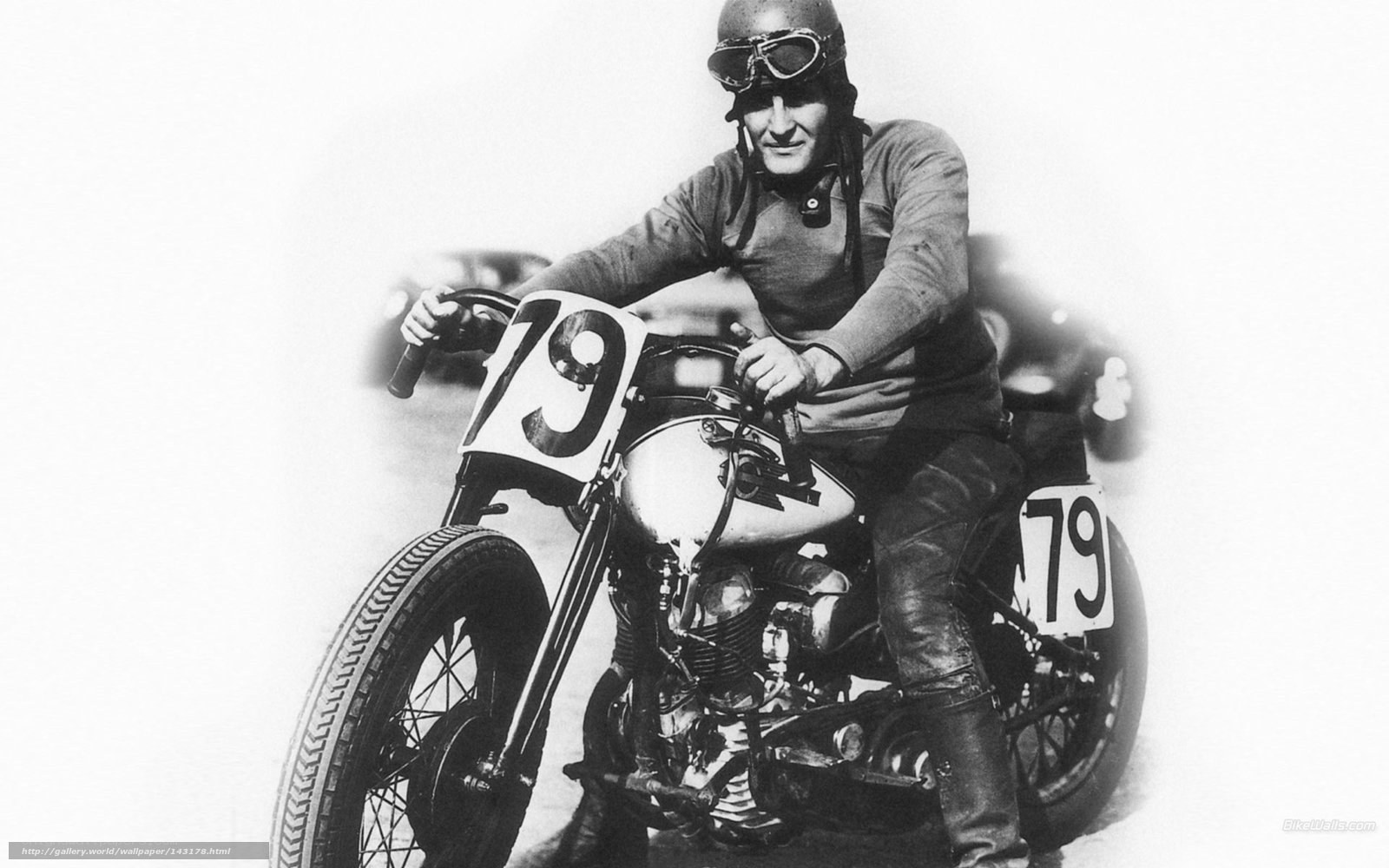 racing motorcyclist in vintage gear