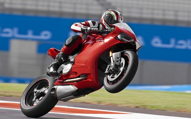 Racing Motorcyclist on Track