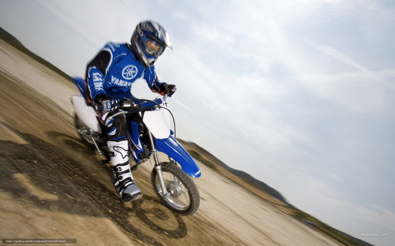 racing on a dirt bike