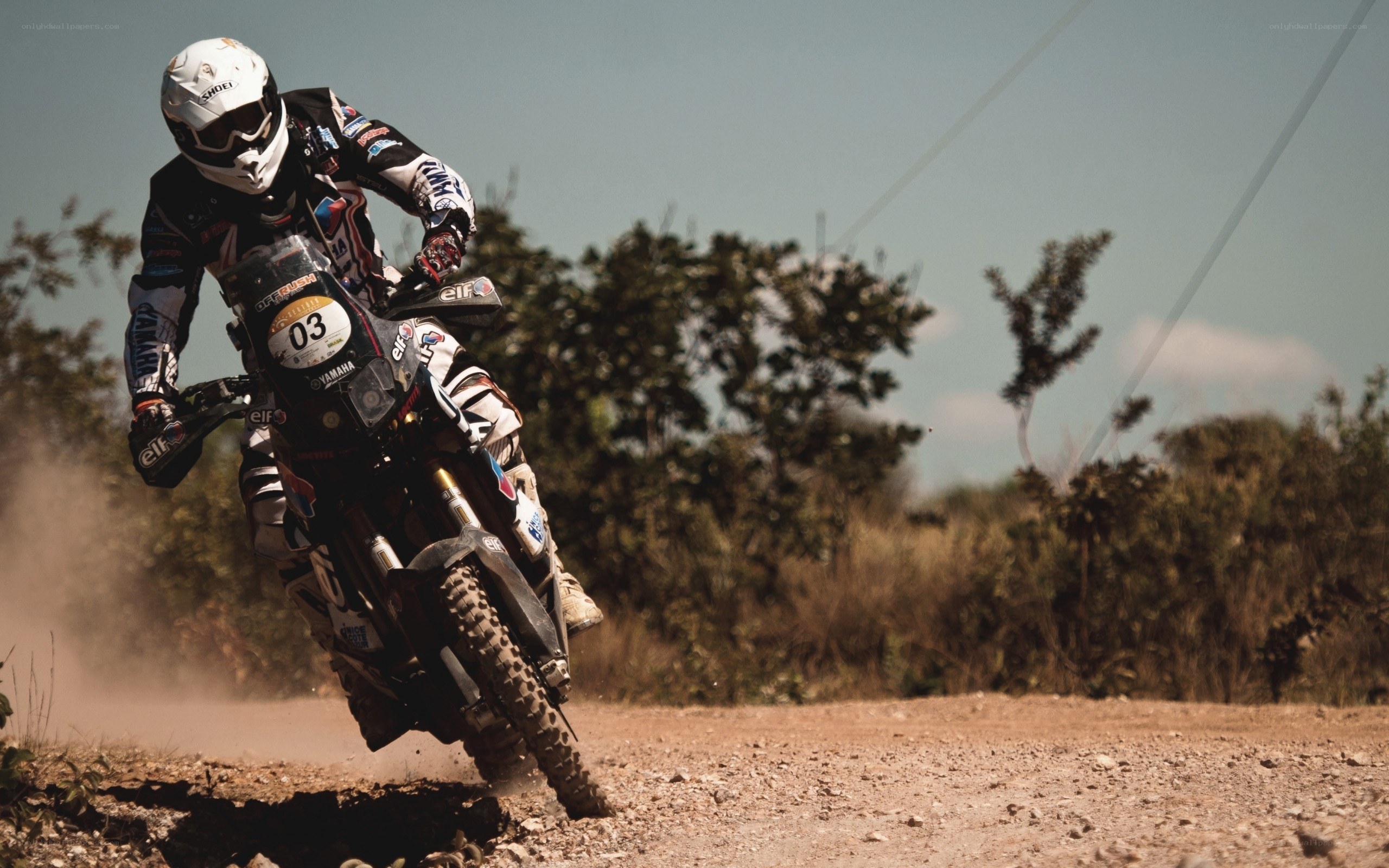 Racing on a dirt bike